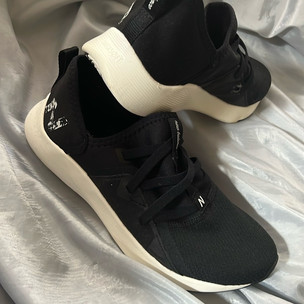 New Balance Black and White Slip-On Sneakers